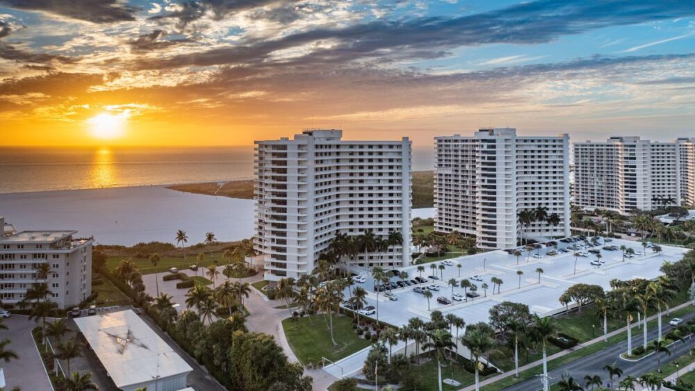 aerial view of sunset behind buildings